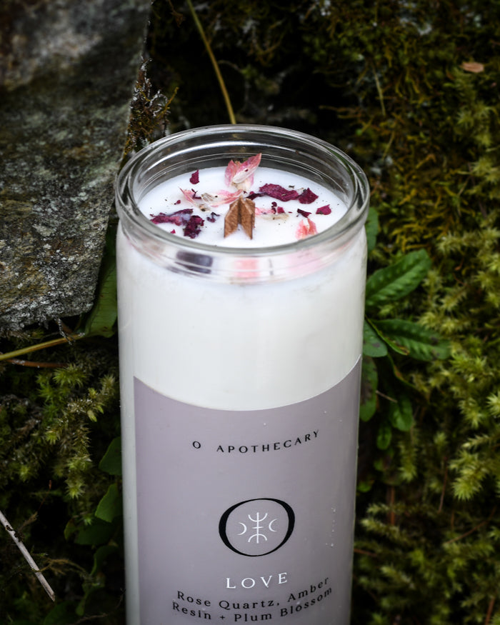 Love Candle by O Apothecary resting in moss